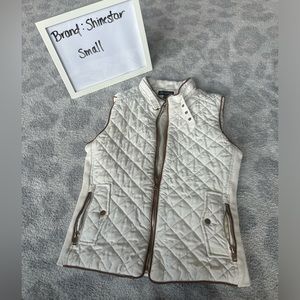 Small white vest with brown trim